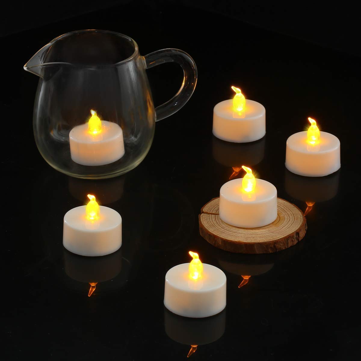 Jialine12 Pack Realistic and Bright Flickering Battery Operated Flameless LED Tea Lights Candles, 200+ tealights Electric Fake Candles for Halloween Weddings Festivals Decoration in Warm Yellow
