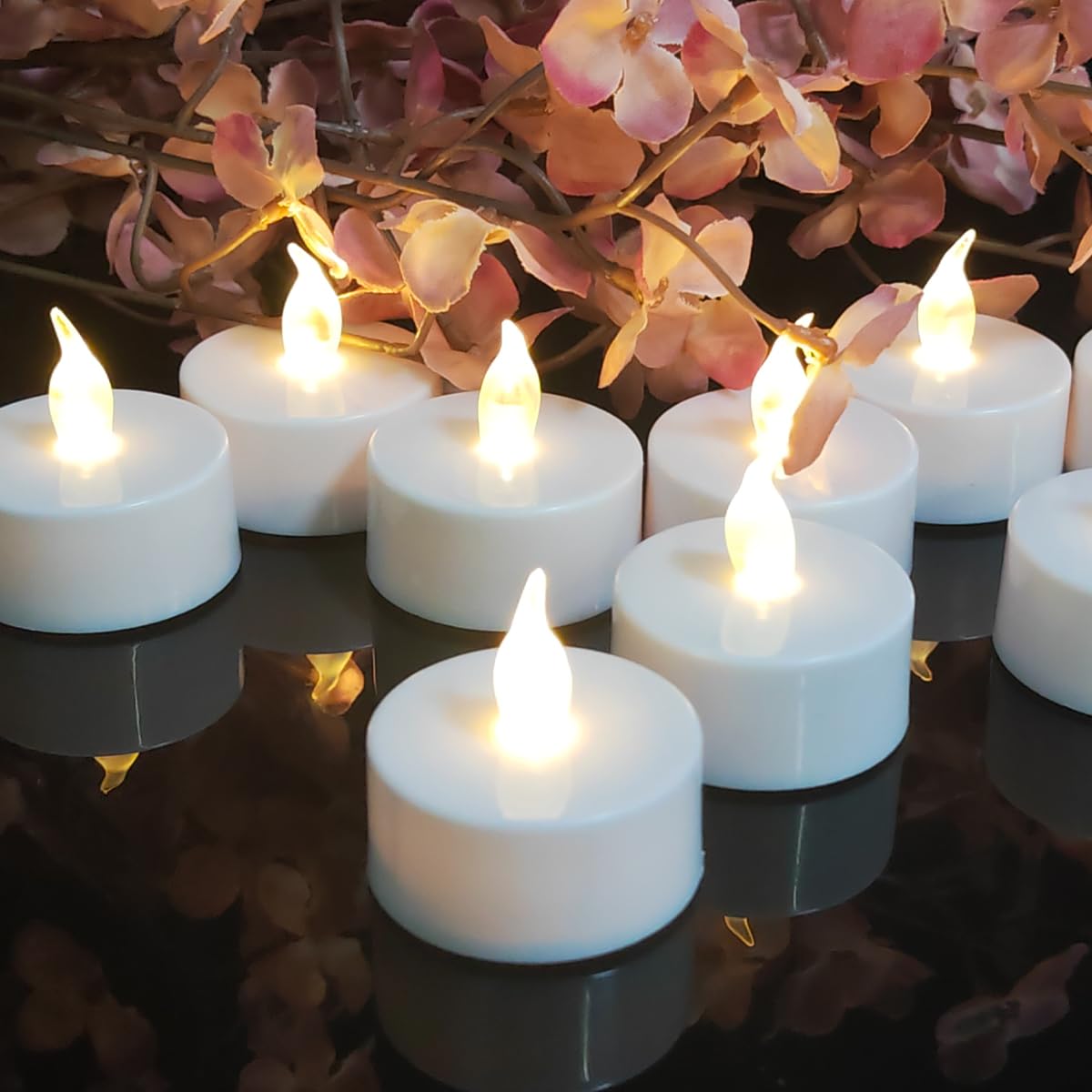 Jialine12 Pack Realistic and Bright Flickering Battery Operated Flameless LED Tea Lights Candles, 200+ tealights Electric Fake Candles for Halloween Weddings Festivals Decoration in Warm Yellow