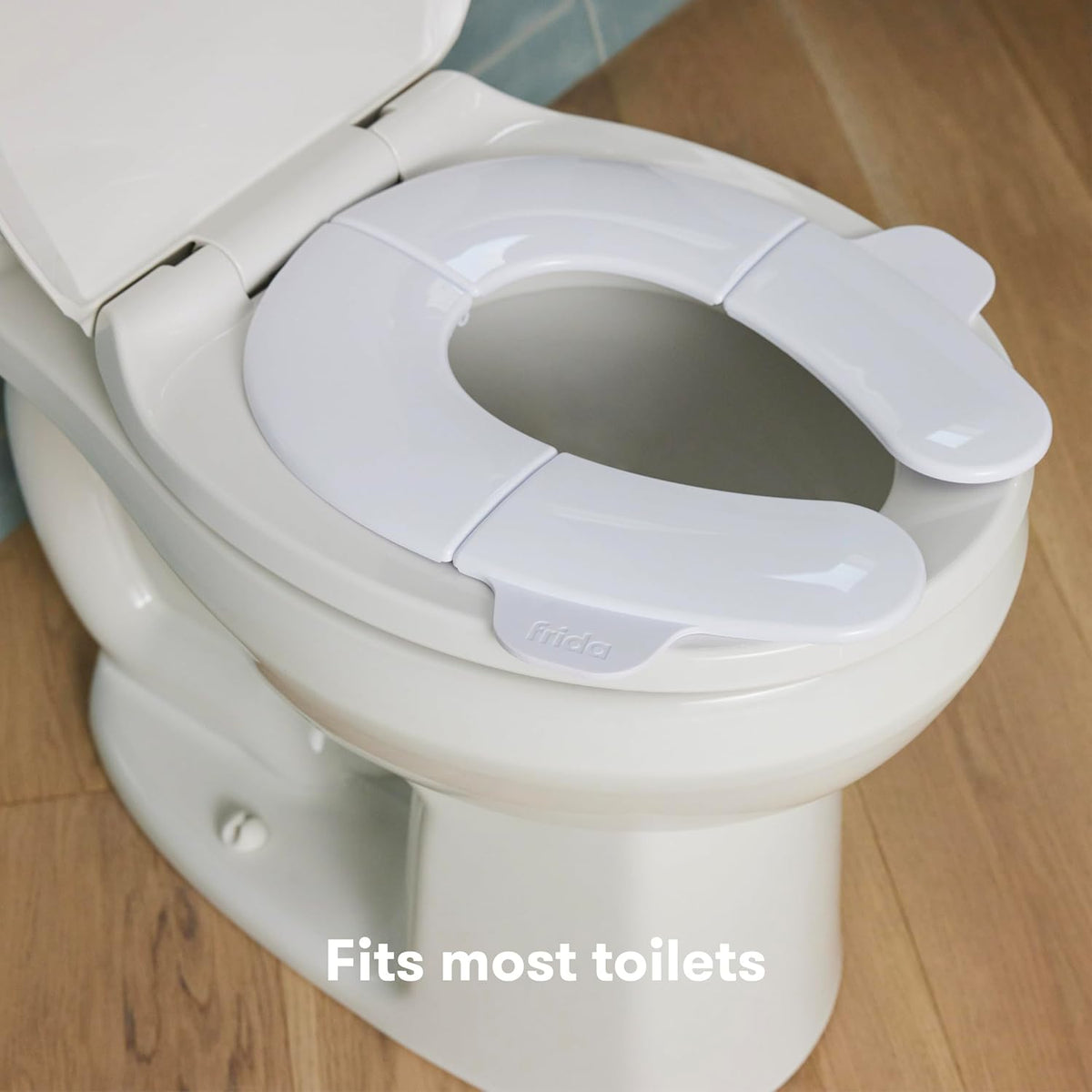 Frida Baby Fold-and-Go Portable Potty Seat for Toilet, with Travel Bag