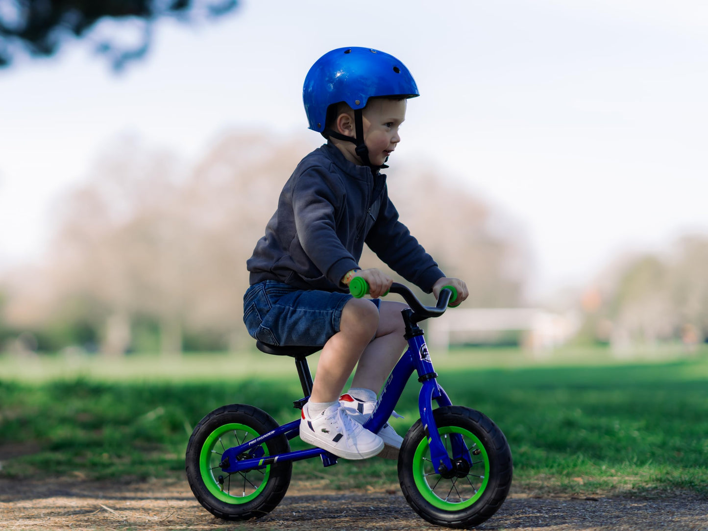 Huffy Pro Thunder Kids Bike 16" with Stabilisers, Bell & Handlebar Pad — Green