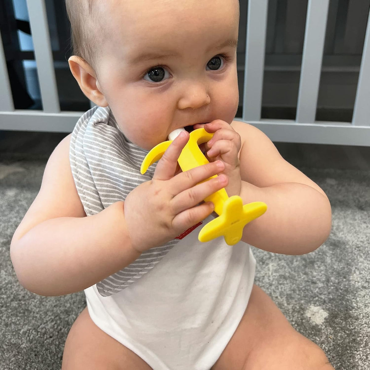 Nuby Silicone Banana Baby Teether Toy for Sore Gums, 3M+