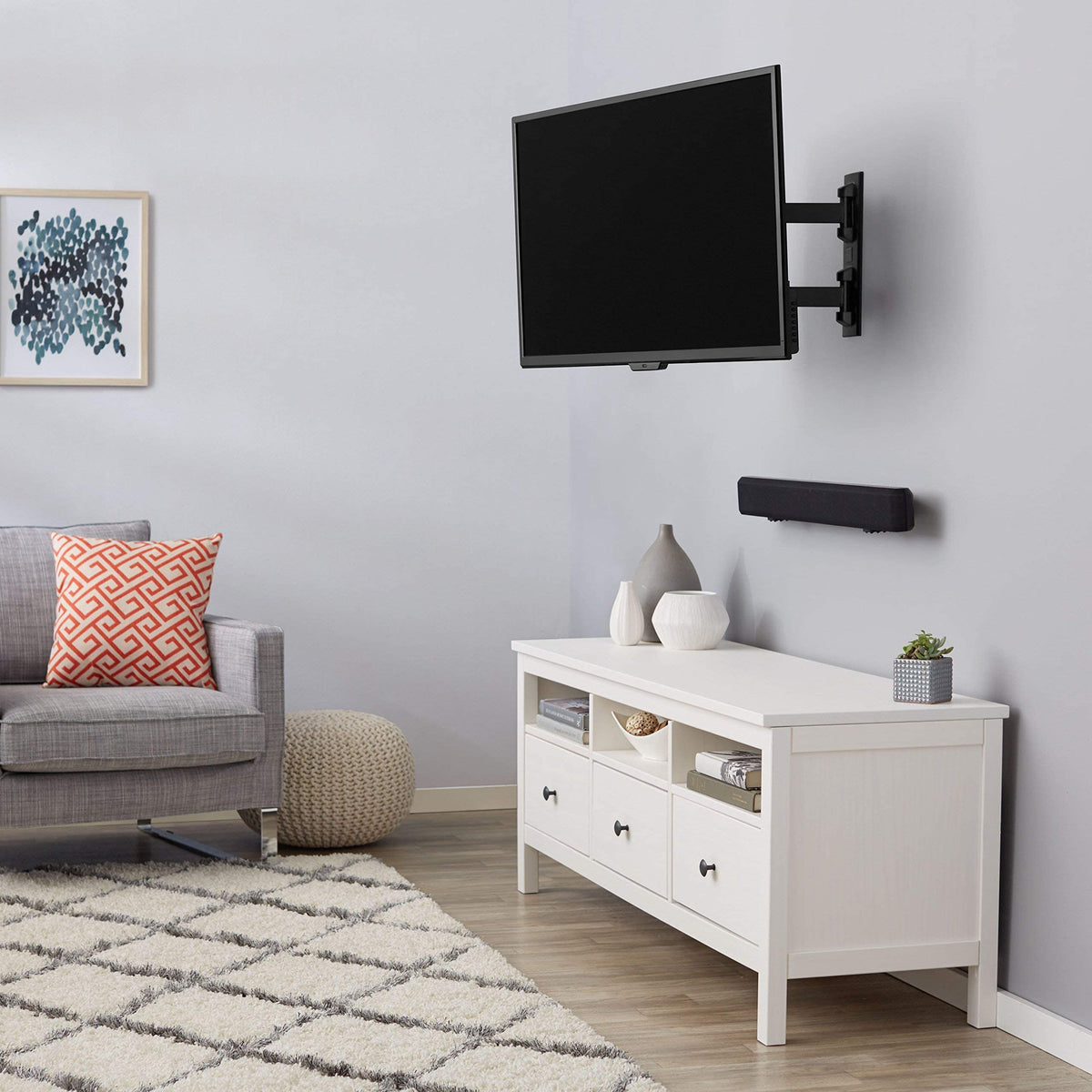 Amazon Basics TV Wall Mount, Full Motion Swivelling Tilting TV Bracket for 12-40 Inch Flat and Curved TV or Monitor up to 36 kg, Max VESA 200x200 mm, Black